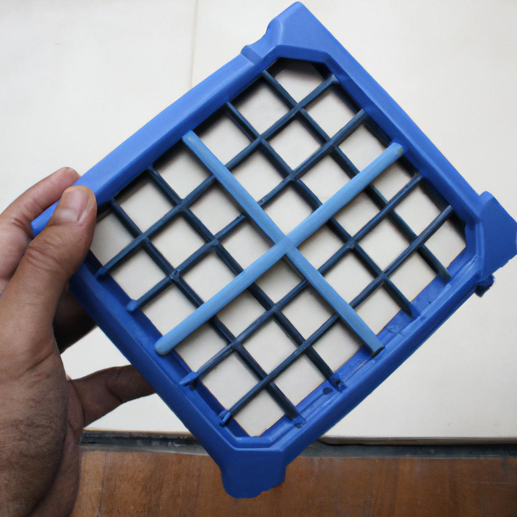 Person holding air filtration device