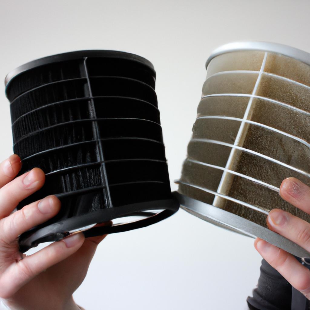 Person holding different air filters