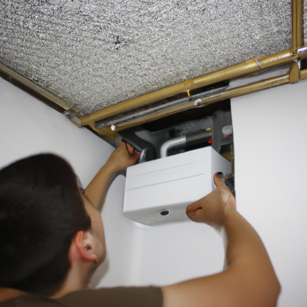 Person installing air filtration system
