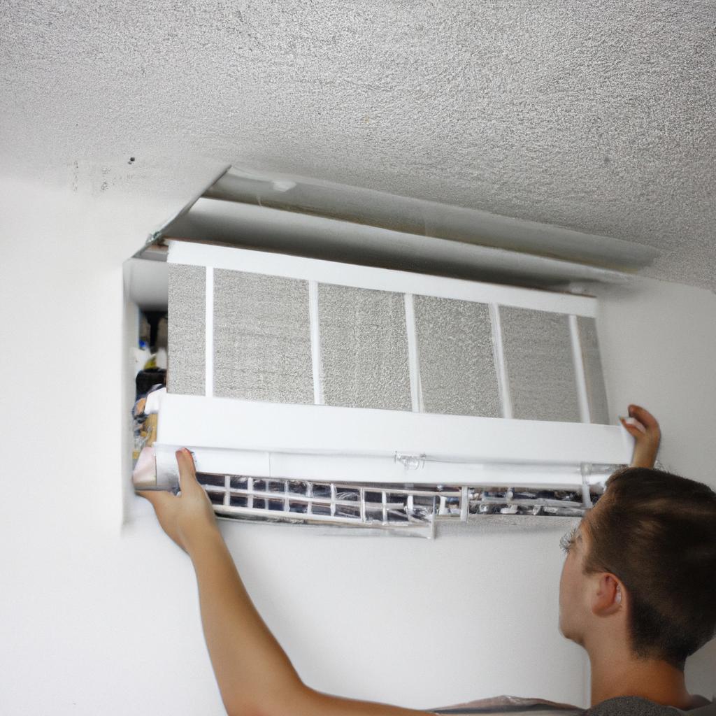 Person installing air filtration system